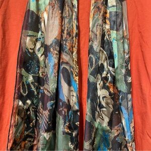 Beautiful Scarf 60”long x 12 1/2” wide .  Made of 100% Polyester